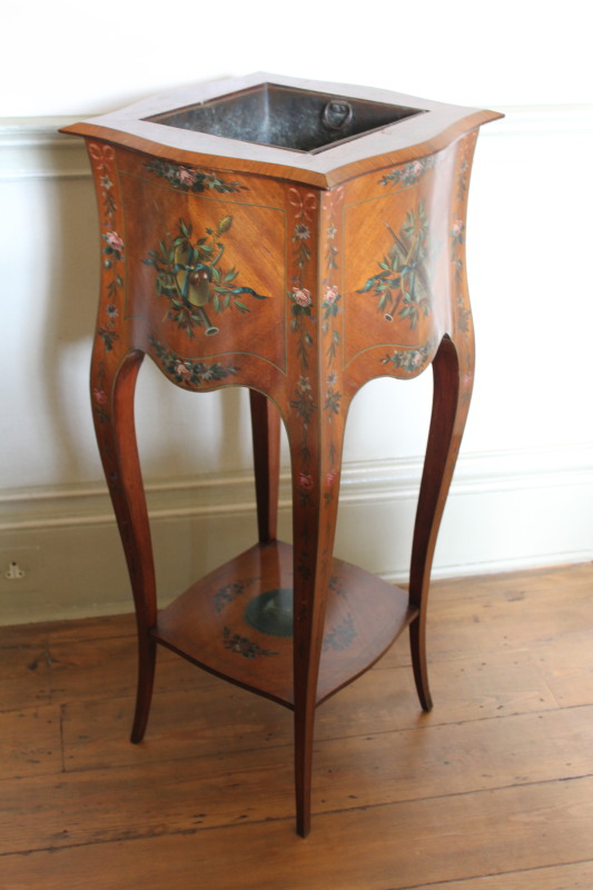 Appraisal: A mahogany parquetry and painted jardiniere stand in the French