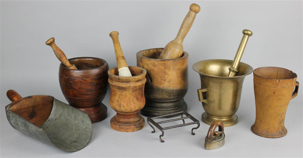 Appraisal: FOUR MORTARS AND PESTLES three of turned wood the tallest