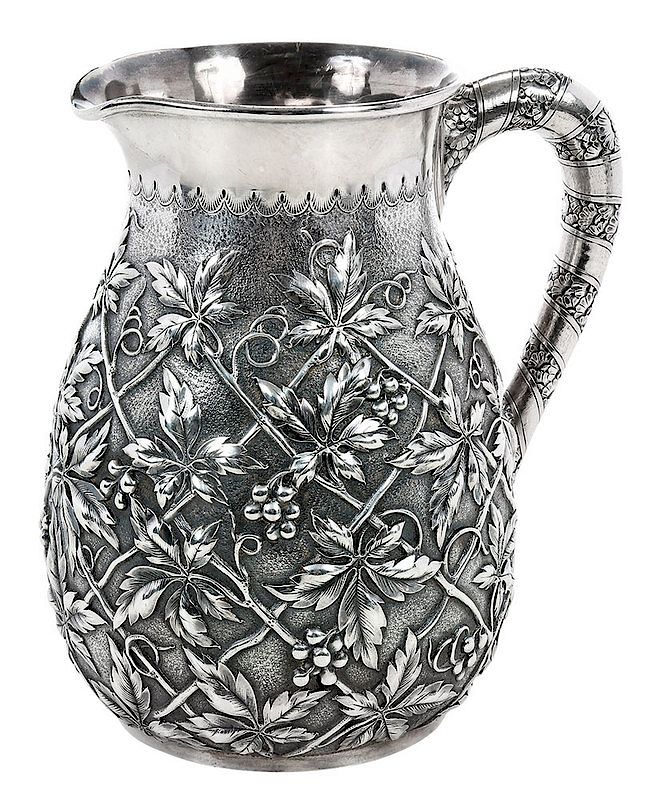 Appraisal: Repousse Sterling Pitcher American late th century oval form with