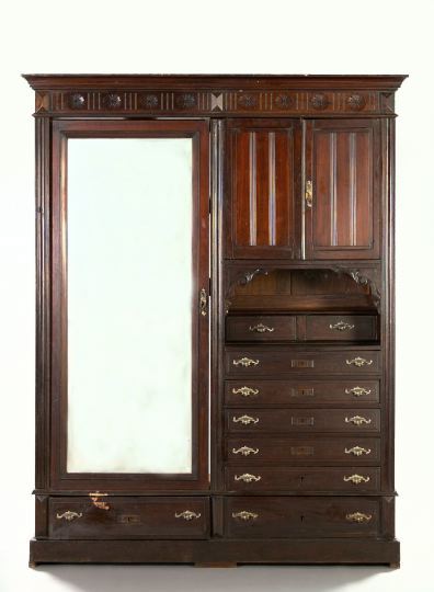 Appraisal: Henri II-Style Mahogany Wardrobe early th century the molded cornice