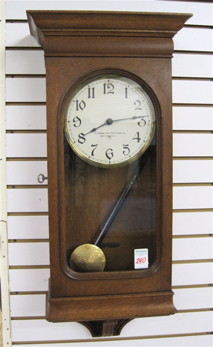 Appraisal: AN AMERICAN OAK WALL CLOCK Automatic Electric Clock Co Chicago