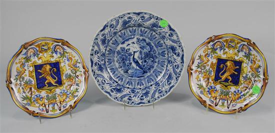 Appraisal: DELFT BLUE AND WHITE CHARGER and TWO ITALIAN POLYCHROMED HERALDIC