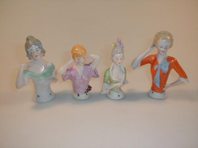 Appraisal: Four German porcelain half dolls