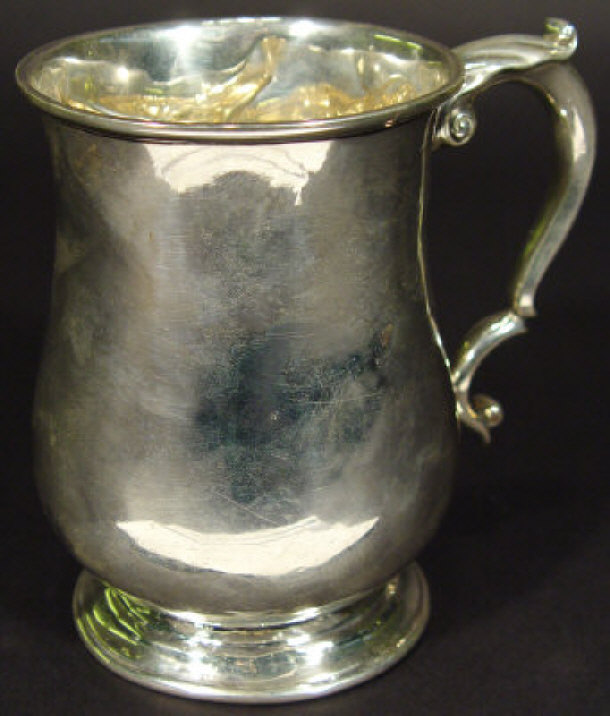 Appraisal: Garrards silver tankard with stepped footrim indistinctly hallmarked cm high