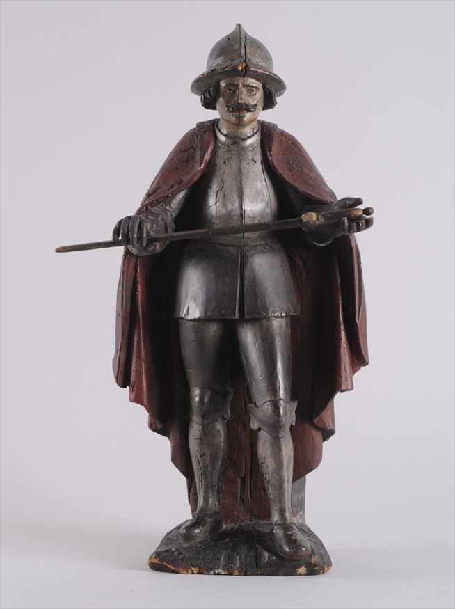 Appraisal: SPANISH BAROQUE CARVED AND PAINTED FIGURE OF A SOLDIER WEARING