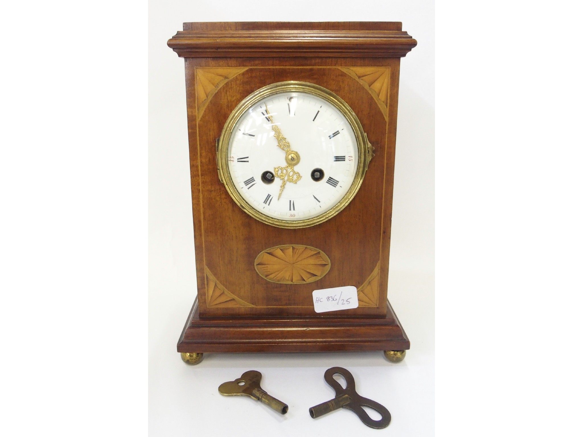 Appraisal: Walnut and fruitwood inlaid mantle clock