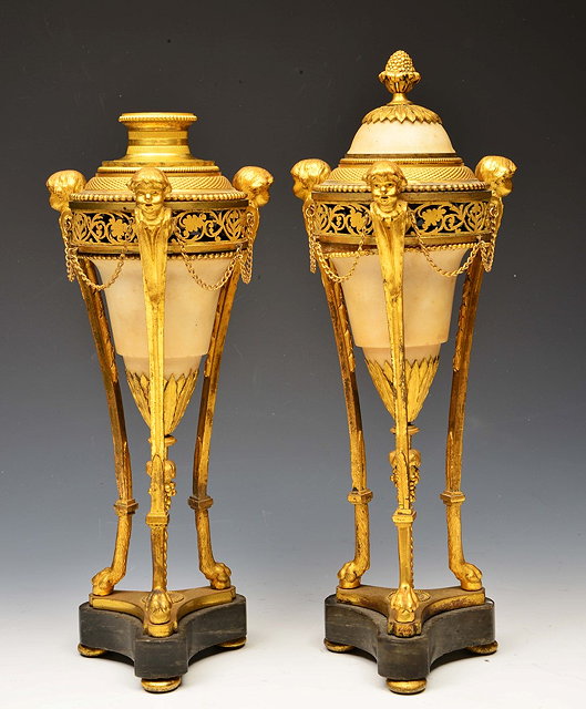 Appraisal: A PAIR OF TH CENTURY FRENCH CREAM MARBLE AND ORMOLU