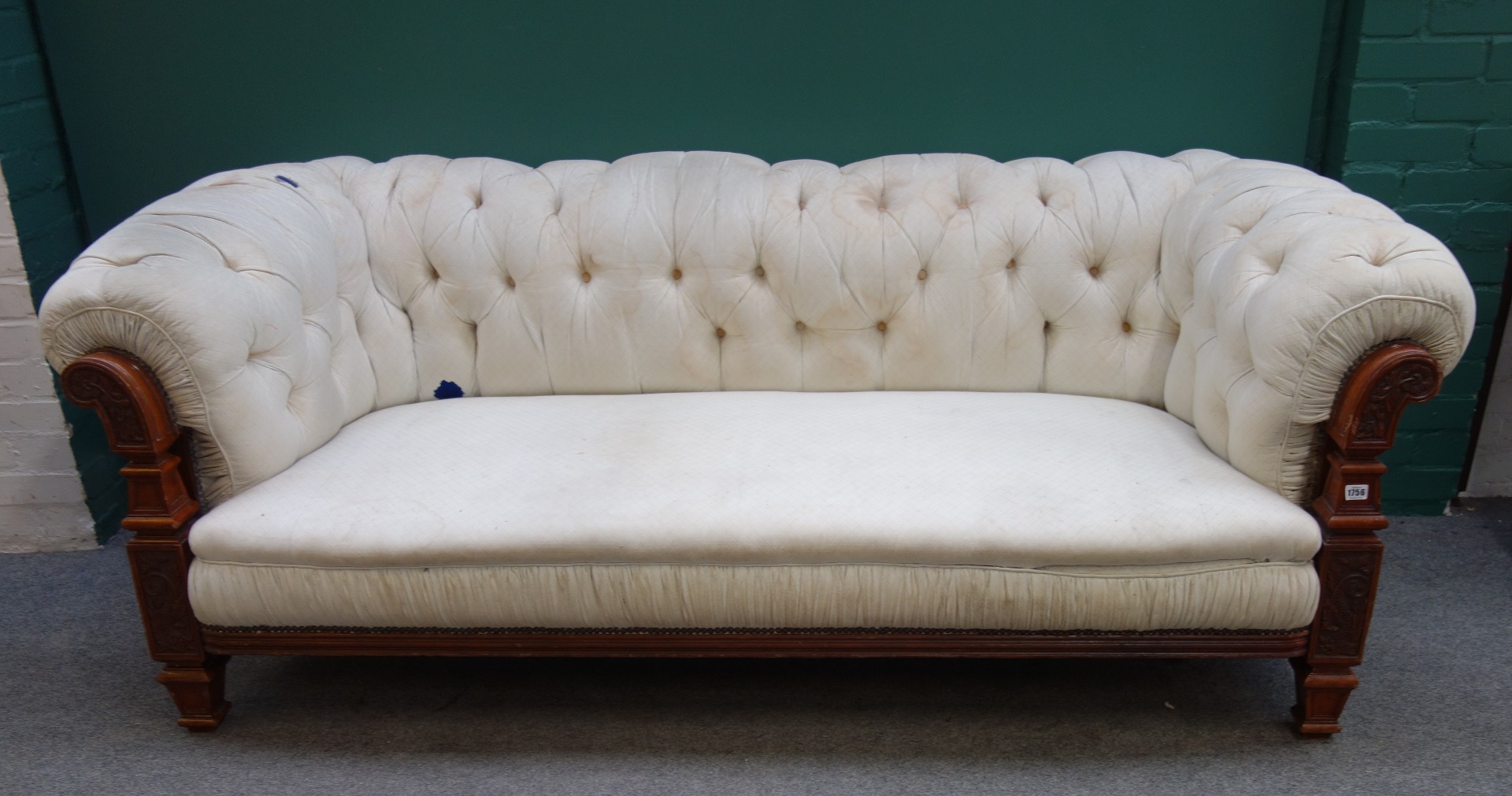 Appraisal: Maple Co a mid Victorian walnut frame Chesterfield sofa the