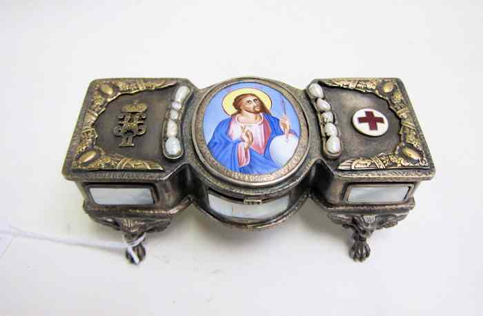 Appraisal: RUSSIAN SILVER-PLATED RED CROSS ICON COVERED BOX Centered with an