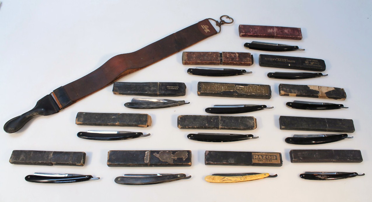 Appraisal: Thirteen cut throat razors including one with a carved ivory