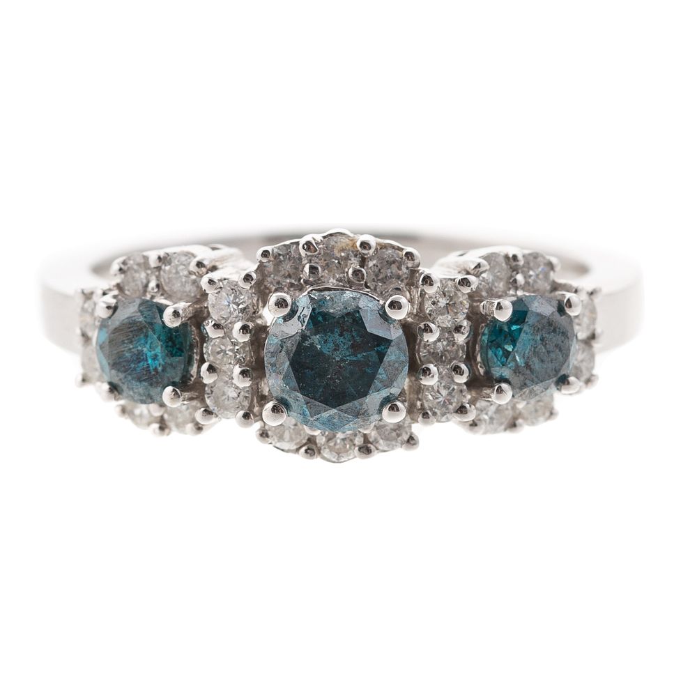 Appraisal: A Multi Blue Diamond Halo Ring in K K white