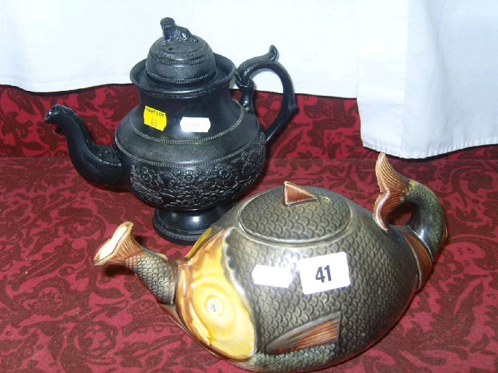 Appraisal: A th century majolica teapot in the form of a