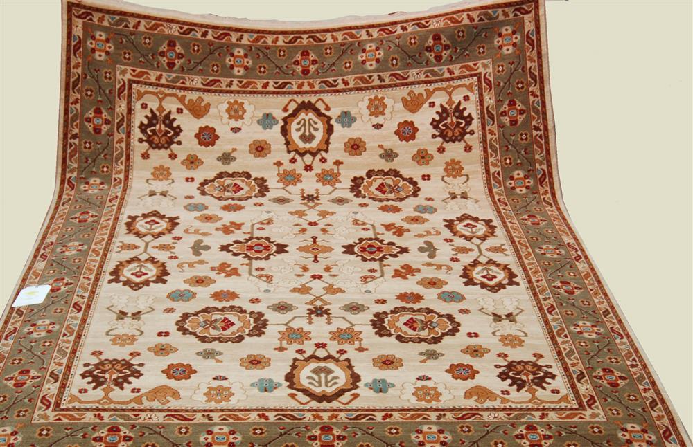 Appraisal: KARASTAN WOOL RUG having an allover pattern of palmettes in