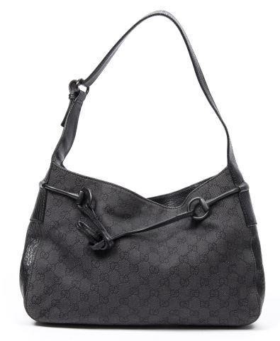 Appraisal: Gucci drawstring Hobo bag in black GG monogram canvas with