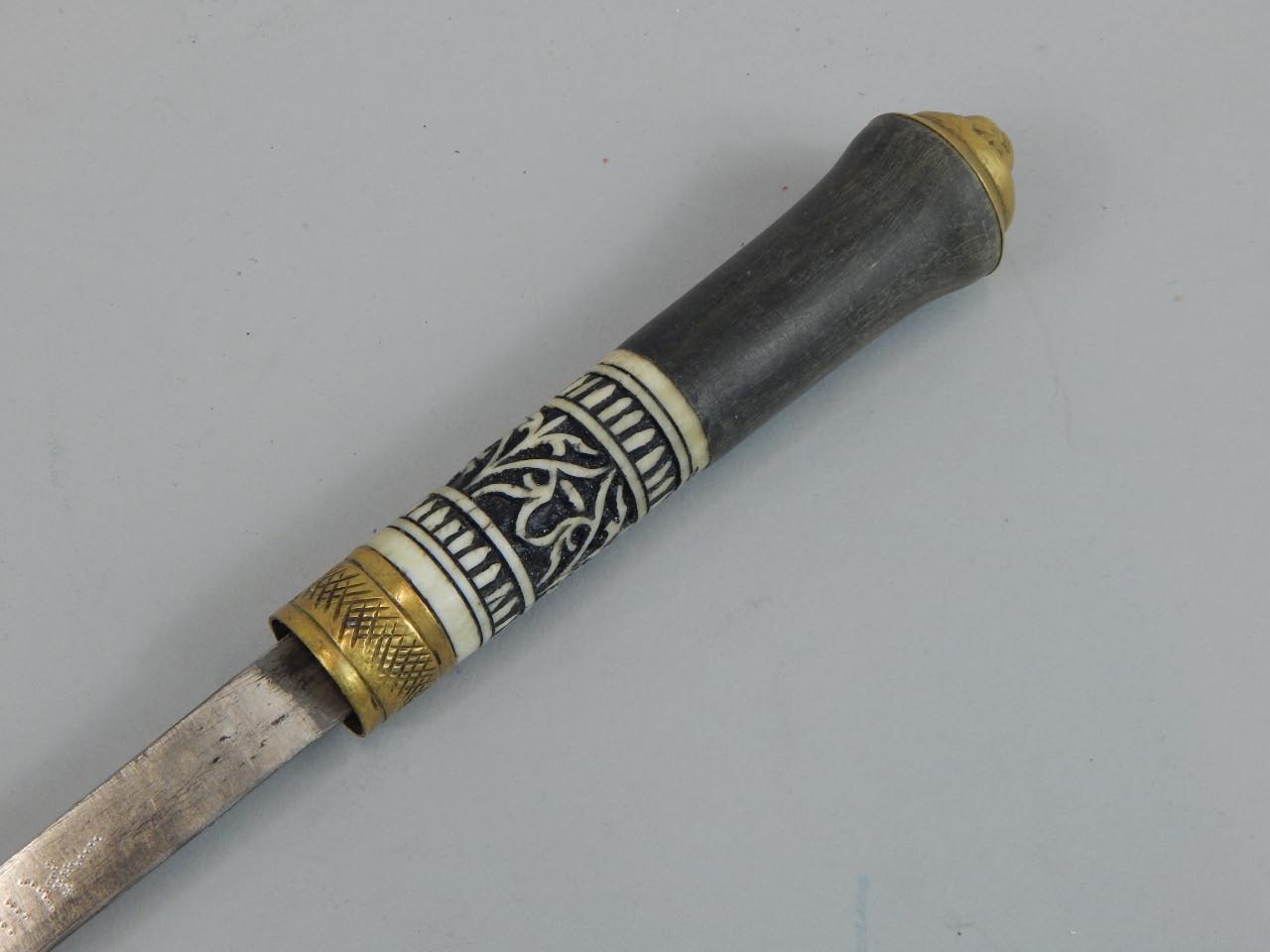 Appraisal: A late thC sword stick with ebonised scabbard decorative hilt