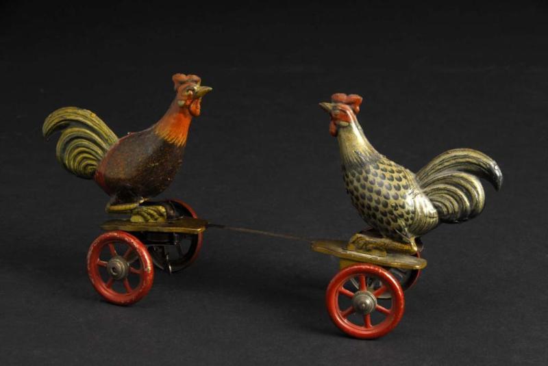 Appraisal: Tin Rooster Fighting Wind-Up Toy Description German Working Marked Germany