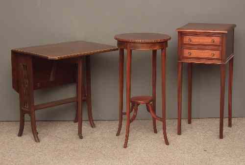 Appraisal: An Edwardian mahogany Sutherland table the top with canted corners