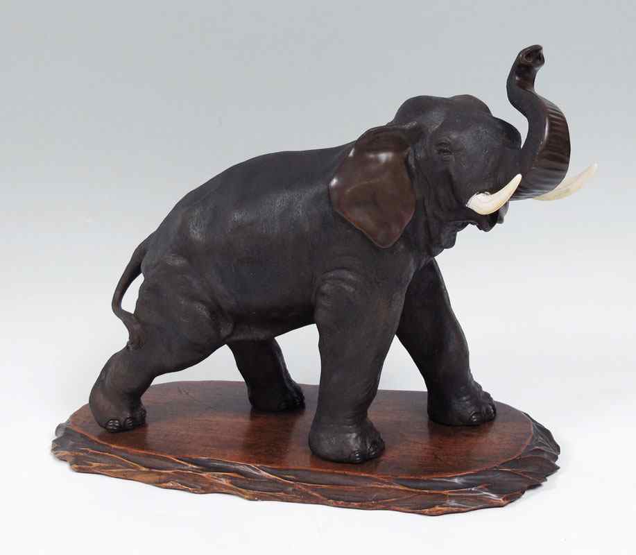 Appraisal: MEIJI PERIOD SIGNED BRONZE ELEPHANT WITH IVORY TUSKS Japanese Meiji