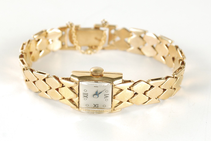 Appraisal: LADY'S FOURTEEN KARAT GOLD INTEGRAL BRACELET WRISTWATCH K yellow gold