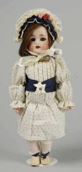 Appraisal: Bisque Kammer Reinhardt Doll with Flirty Eyes Description German Bisque