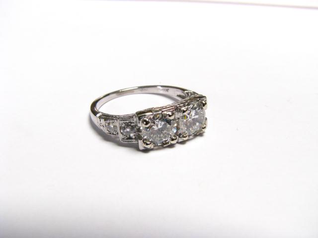 Appraisal: Lady's platinum diamond ring with and ct round cut diamond