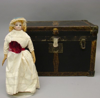 Appraisal: Unmarked French Fashion style doll trunk Bisque swivel head shoulderplate