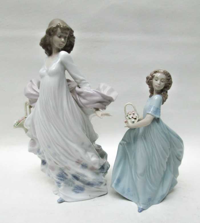 Appraisal: TWO LLADRO PORCELAIN FIGURINES by sculptor Regino Torrijos Spring Splendor