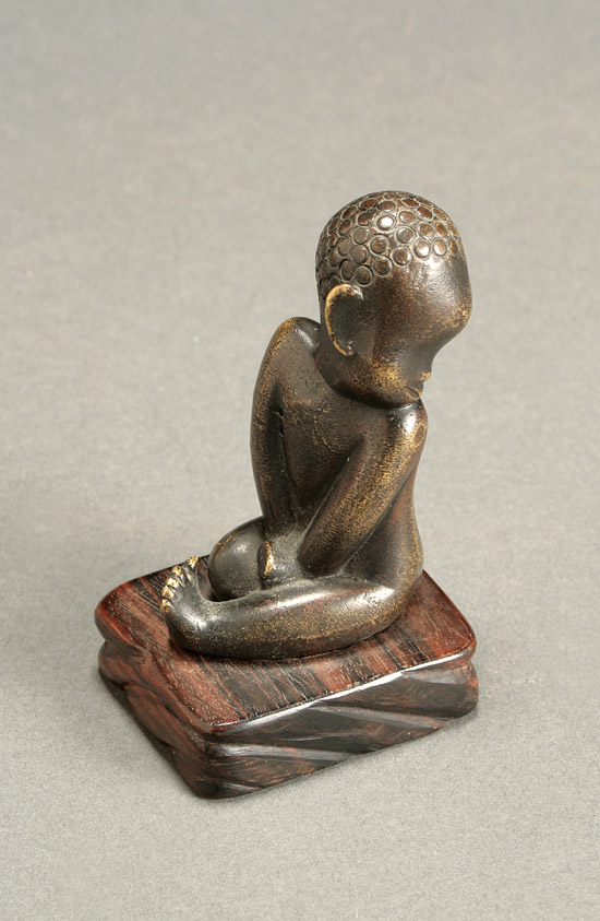 Appraisal: Hagenauer Bronze Figure of a Seated Nude African Boy Circa