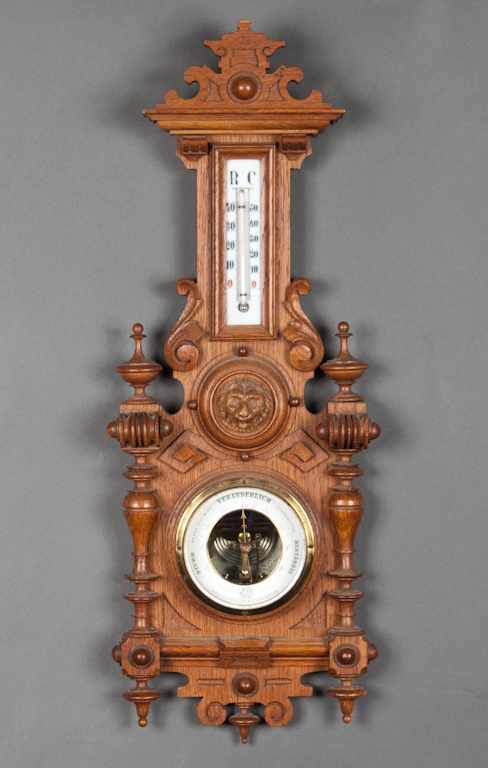 Appraisal: German carved walnut barometer thermometer D Brauckmann Co Hamburg late