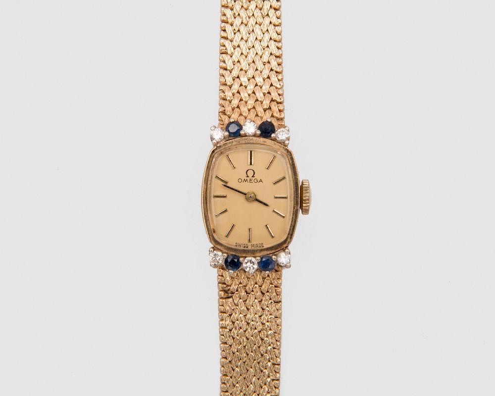 Appraisal: OMEGA K Yellow Gold Diamond and Sapphire Wristwatch OMEGA K