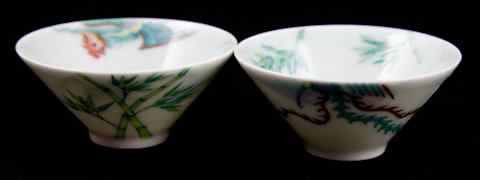 Appraisal: TWO SMALL DOUCAI WINE CUPS Qing dynasty with six-character underglaze