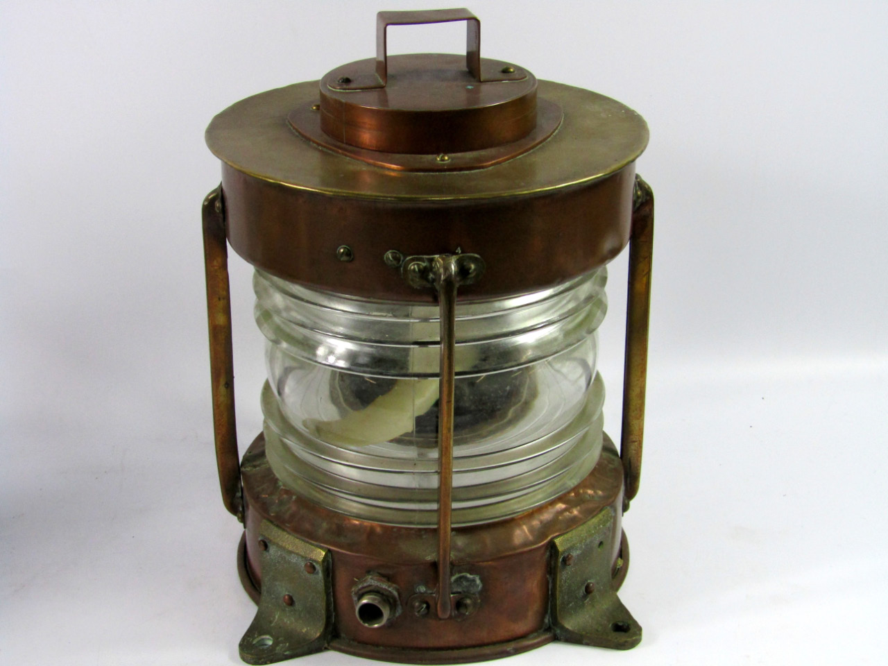 Appraisal: A copper and brass ship's lantern cm high