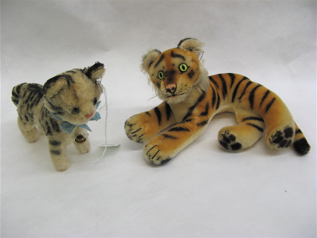 Appraisal: TWO GERMAN STEIFF STUFFED ANIMALS Tiger mohair body orange with