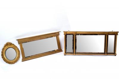 Appraisal: A Regency overmantel mirror the three plates divided by fluted