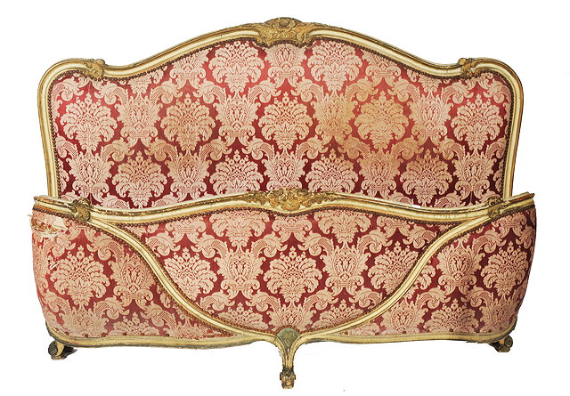 Appraisal: A FRENCH DOUBLE BED with the head with carved and