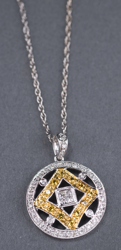 Appraisal: KT white gold sapphire and diamond pendant Pendant is mm