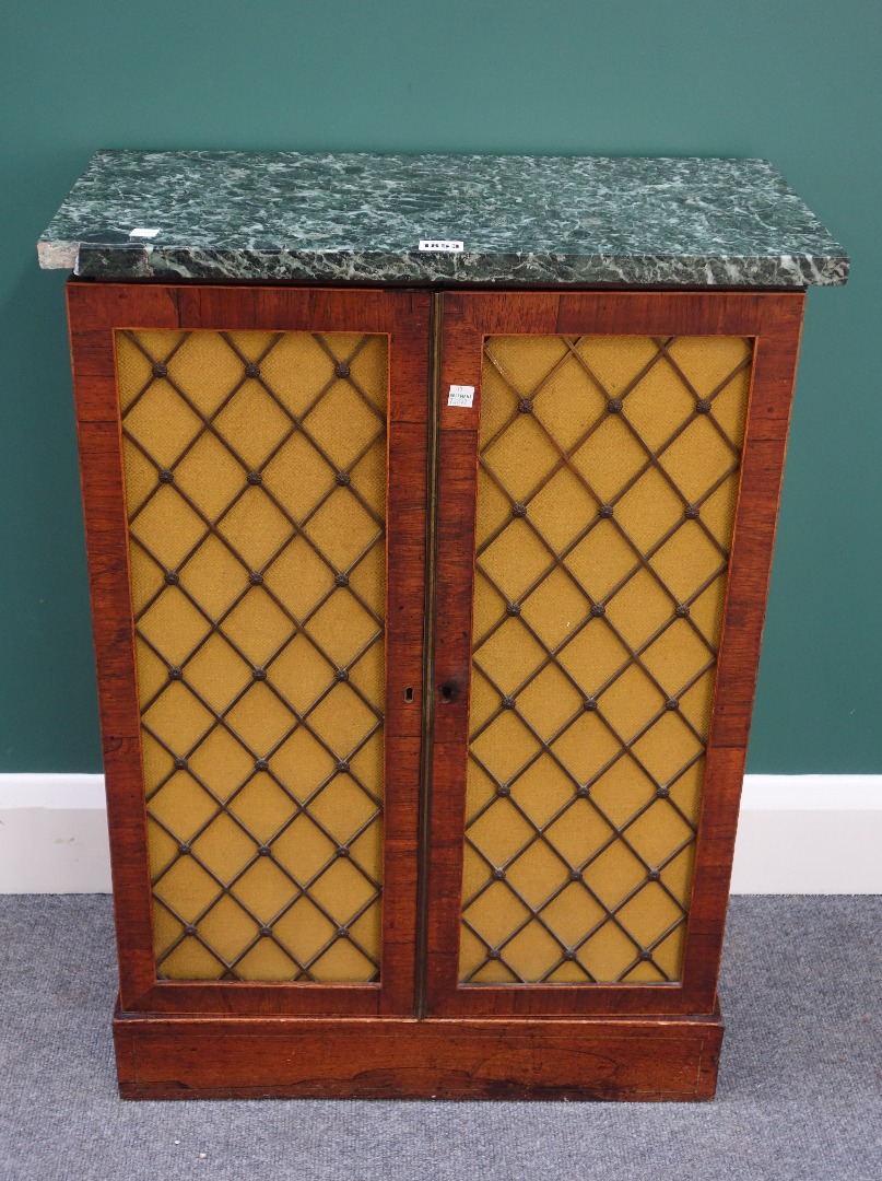 Appraisal: A Regency side cabinet the marble top over a boxwood