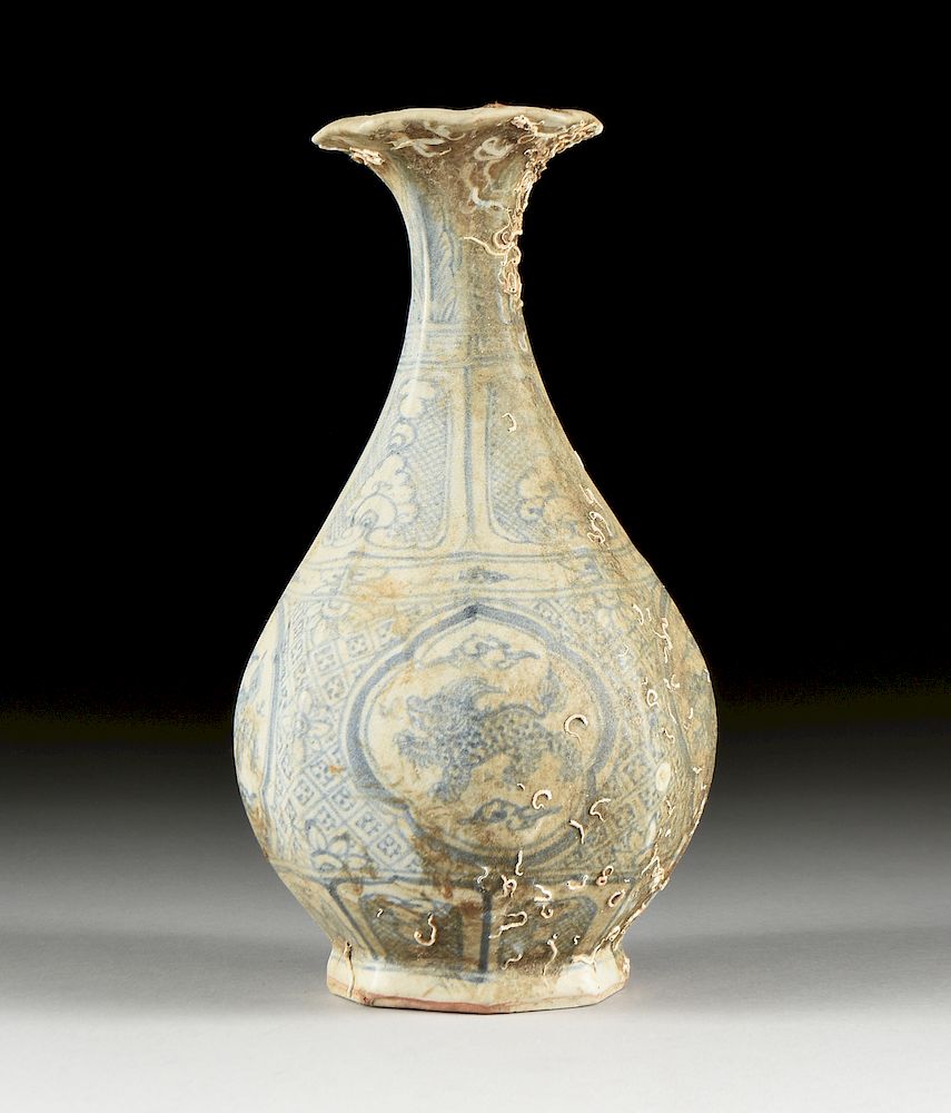 Appraisal: A VIETNAMESE ANNAMESE BLUE AND WHITE PORCELAIN BOTTLE VASE SHIPWRECK