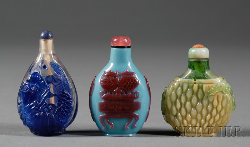 Appraisal: Three Peking Glass Snuff Bottles cameo-type blue to cut to