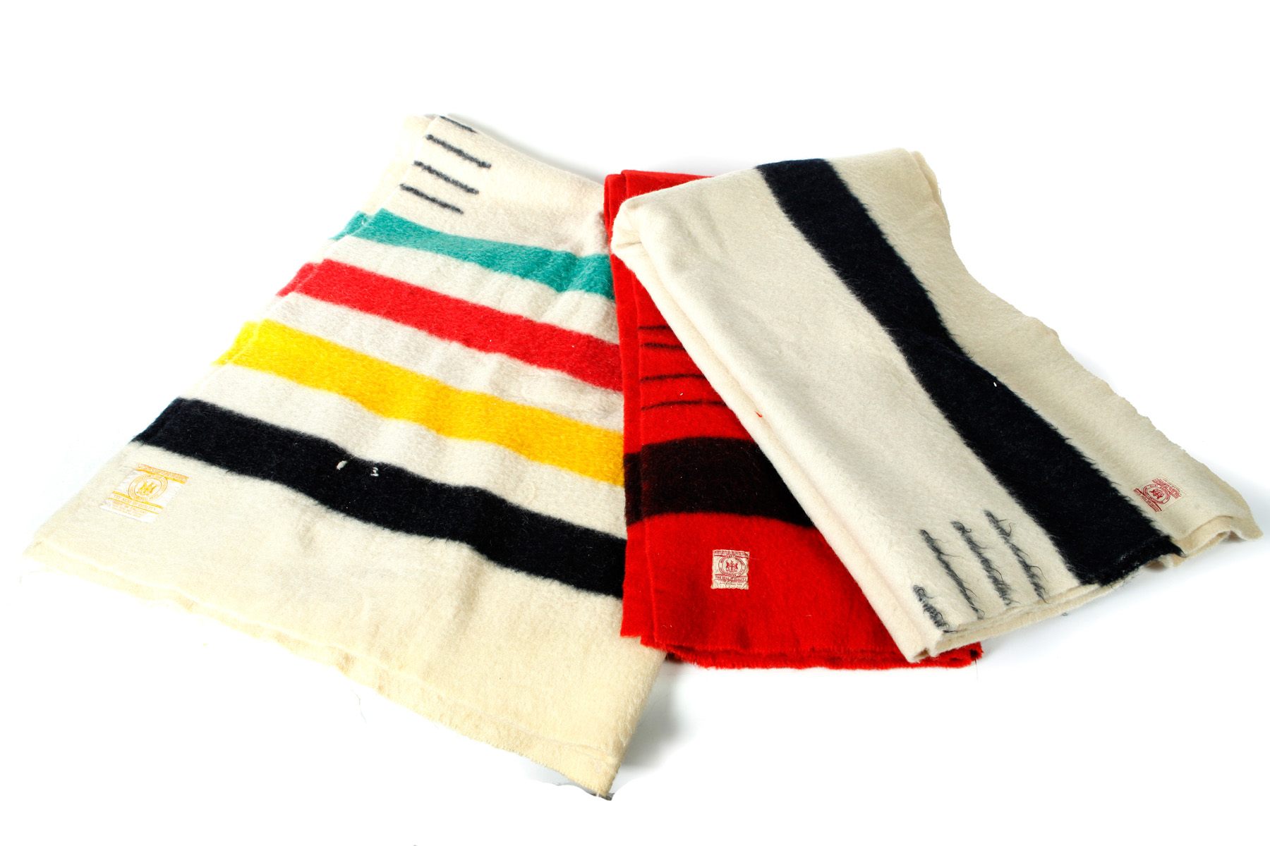 Appraisal: THREE HUDSON BAY WOOL BLANKETS Mid th century Labeled with