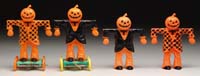 Appraisal: LOT OF FOUR PLASTIC PUMPKIN-HEADED SCARECROWS One orange and black