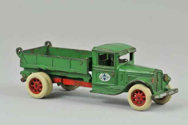 Appraisal: ARCADE INTERNATIONAL DUMP TRUCK Arcade cast iron painted in green