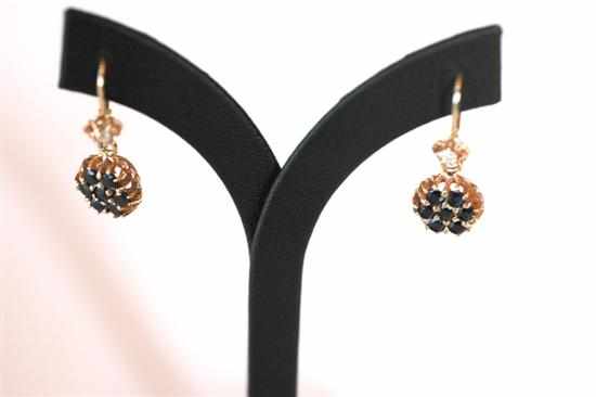 Appraisal: A PAIR OF SAPPHIRE CLUSTER EARRINGS WITH DIAMOND SET FITTINGS