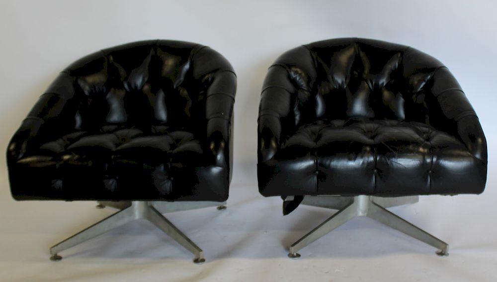 Appraisal: MIDCENTURY Pair Of Leather Upholstered Club Chairs Nice quality leather