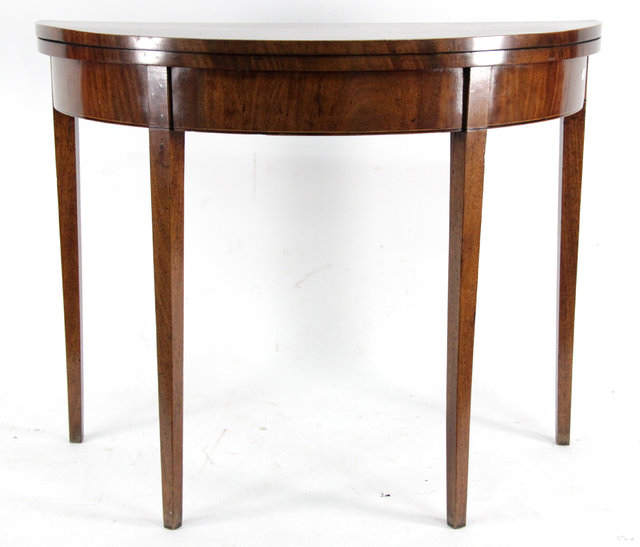 Appraisal: A George III mahogany card table circa the crossbanded semi-circular