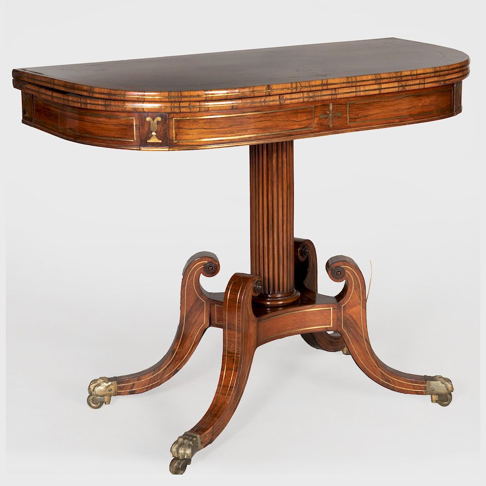 Appraisal: Regency Brass-Mounted Rosewood Games Table The hinged top opening to