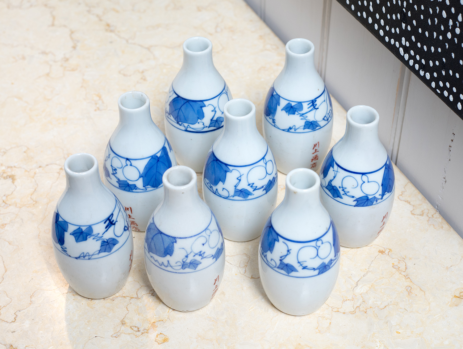 Appraisal: EIGHT VINTAGE JAPANESE SAKI BOTTLES Porcelian with blue hand painted