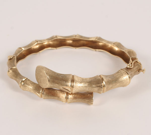 Appraisal: Gold marked K hinged bracelet with chased bamboo design inner