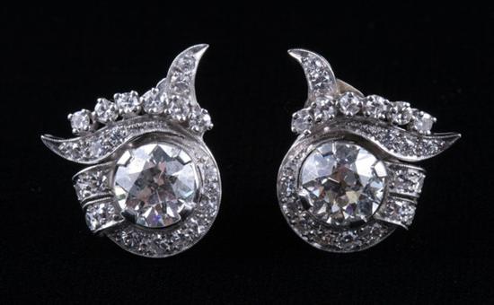 Appraisal: PAIR PLATINUM K WHITE GOLD AND DIAMOND STYLIZED LEAF DESIGN