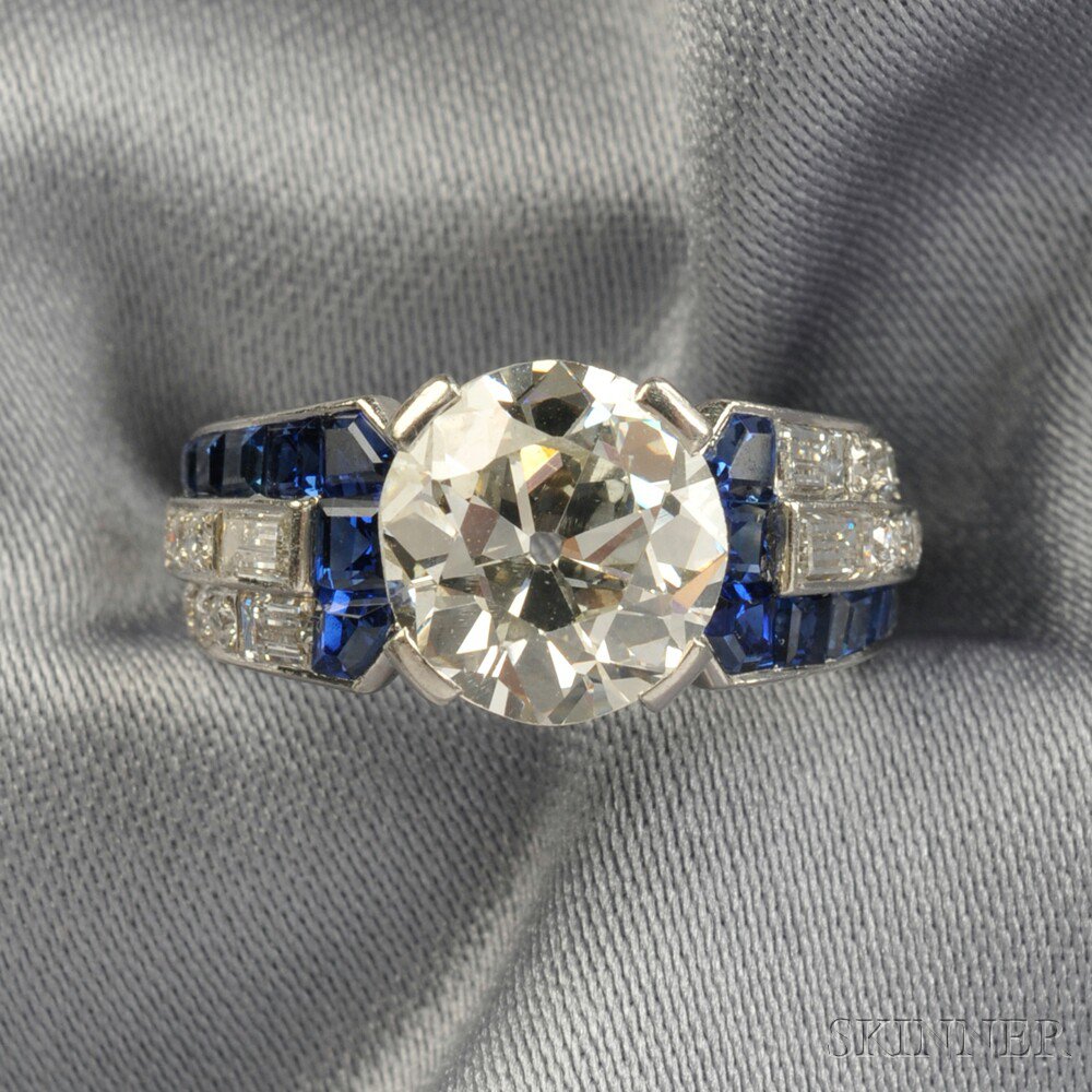 Appraisal: Platinum Sapphire and Diamond Ring prong-set with an old European-cut